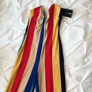 Multi colored jumpsuit with tags